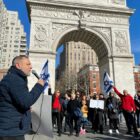 Amichai addressing protest at Washington Square arch