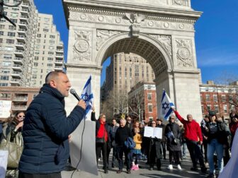 Amichai addressing protest at Washington Square arch