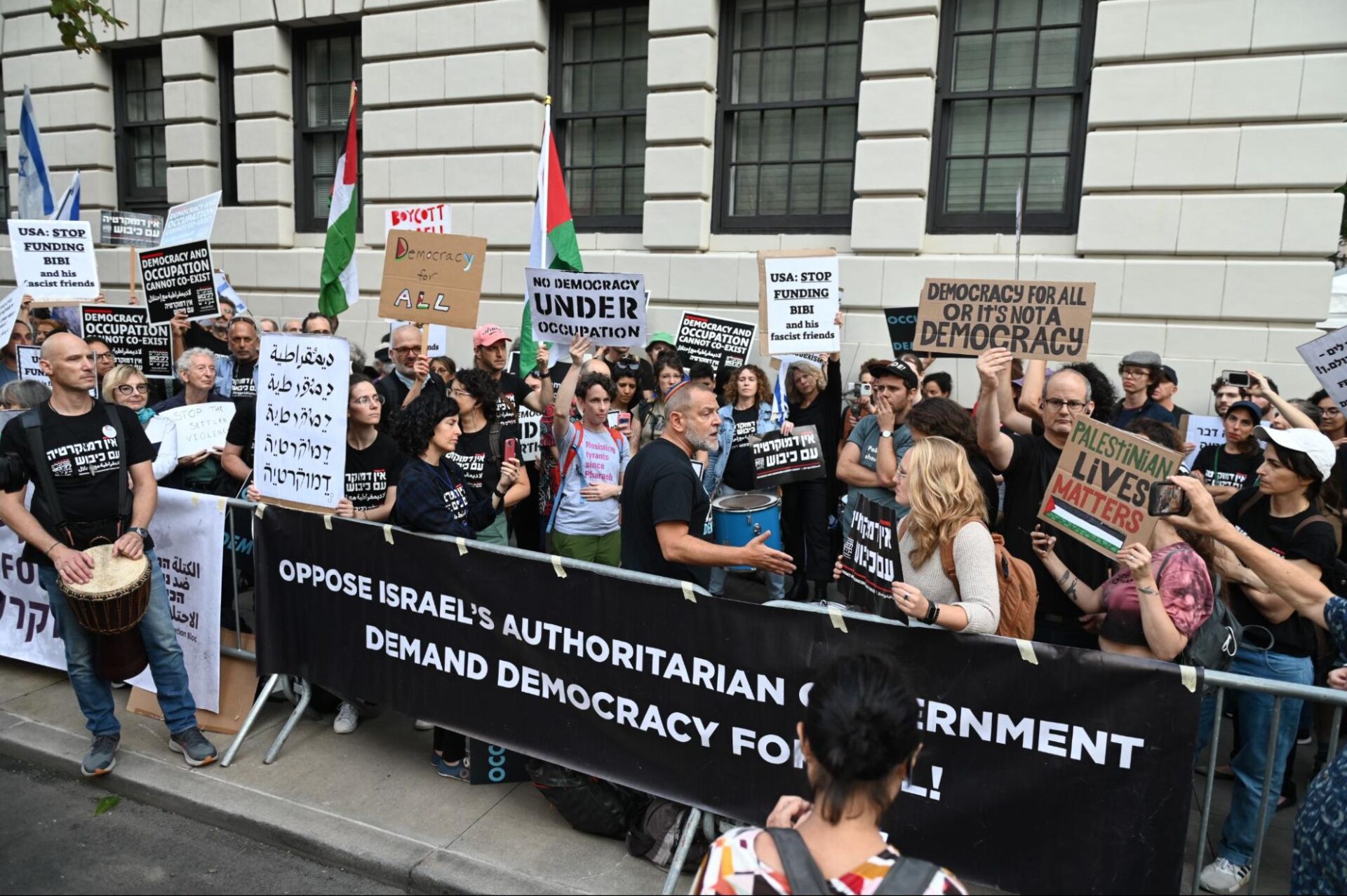 Rabbi Amichai speaks to the Israeli bloc of the anti-occupation protest outside the hotel where Netanyahu was staying during his visit to New York City.